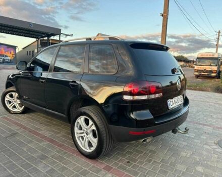 Черный Фольксваген Туарег, объемом двигателя 3 л и пробегом 198 тыс. км за 13086 $, фото 1 на Automoto.ua