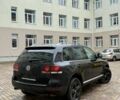 Чорний Фольксваген Туарег, об'ємом двигуна 3 л та пробігом 300 тис. км за 6490 $, фото 4 на Automoto.ua