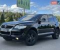 Чорний Фольксваген Туарег, об'ємом двигуна 3 л та пробігом 251 тис. км за 10699 $, фото 51 на Automoto.ua