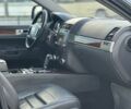 Черный Фольксваген Туарег, объемом двигателя 3 л и пробегом 225 тыс. км за 5000 $, фото 1 на Automoto.ua