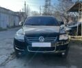 Чорний Фольксваген Туарег, об'ємом двигуна 3 л та пробігом 335 тис. км за 8499 $, фото 1 на Automoto.ua
