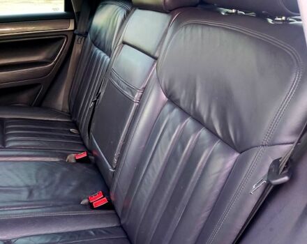 Чорний Фольксваген Туарег, об'ємом двигуна 3 л та пробігом 297 тис. км за 11777 $, фото 5 на Automoto.ua