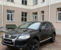 Чорний Фольксваген Туарег, об'ємом двигуна 3 л та пробігом 300 тис. км за 6490 $, фото 1 на Automoto.ua