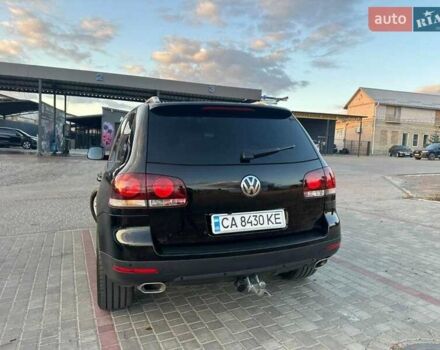 Черный Фольксваген Туарег, объемом двигателя 3 л и пробегом 198 тыс. км за 13086 $, фото 1 на Automoto.ua