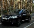 Чорний Фольксваген Туарег, об'ємом двигуна 3 л та пробігом 300 тис. км за 11000 $, фото 1 на Automoto.ua