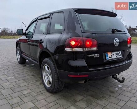 Черный Фольксваген Туарег, объемом двигателя 3 л и пробегом 305 тыс. км за 5850 $, фото 2 на Automoto.ua