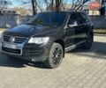 Черный Фольксваген Туарег, объемом двигателя 4.2 л и пробегом 286 тыс. км за 8999 $, фото 55 на Automoto.ua