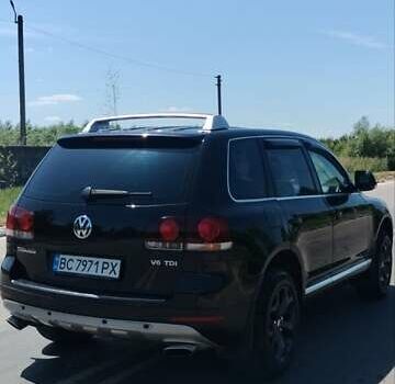 Черный Фольксваген Туарег, объемом двигателя 2.97 л и пробегом 344 тыс. км за 10950 $, фото 1 на Automoto.ua