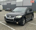 Черный Фольксваген Туарег, объемом двигателя 3 л и пробегом 270 тыс. км за 10500 $, фото 1 на Automoto.ua