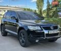 Чорний Фольксваген Туарег, об'ємом двигуна 3 л та пробігом 251 тис. км за 10699 $, фото 2 на Automoto.ua