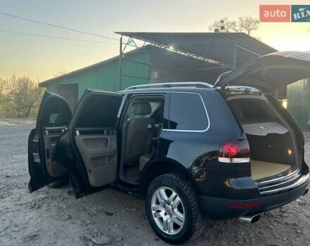 Чорний Фольксваген Туарег, об'ємом двигуна 3 л та пробігом 283 тис. км за 12200 $, фото 3 на Automoto.ua