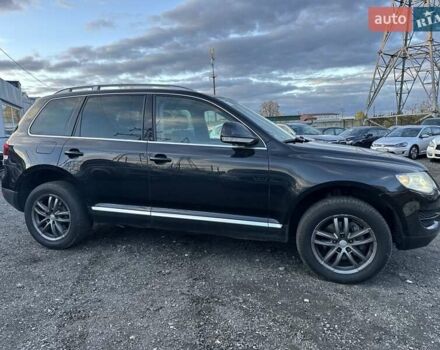 Чорний Фольксваген Туарег, об'ємом двигуна 3 л та пробігом 340 тис. км за 10900 $, фото 6 на Automoto.ua