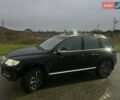 Черный Фольксваген Туарег, объемом двигателя 2.97 л и пробегом 159 тыс. км за 13800 $, фото 2 на Automoto.ua
