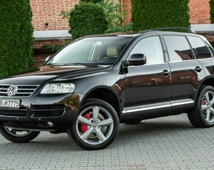 Черный Фольксваген Туарег, объемом двигателя 3 л и пробегом 240 тыс. км за 4000 $, фото 1 на Automoto.ua
