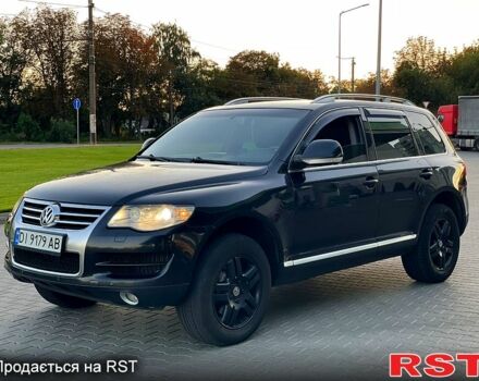 Черный Фольксваген Туарег, объемом двигателя 3 л и пробегом 258 тыс. км за 10800 $, фото 1 на Automoto.ua