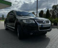 Черный Фольксваген Туарег, объемом двигателя 3 л и пробегом 289 тыс. км за 11800 $, фото 1 на Automoto.ua