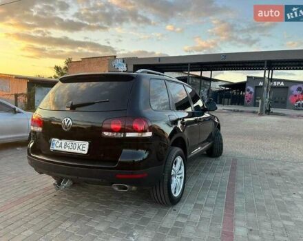 Черный Фольксваген Туарег, объемом двигателя 3 л и пробегом 198 тыс. км за 13086 $, фото 2 на Automoto.ua
