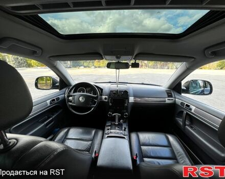 Черный Фольксваген Туарег, объемом двигателя 3 л и пробегом 325 тыс. км за 13000 $, фото 2 на Automoto.ua