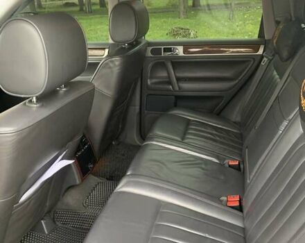 Чорний Фольксваген Туарег, об'ємом двигуна 3 л та пробігом 270 тис. км за 14700 $, фото 7 на Automoto.ua