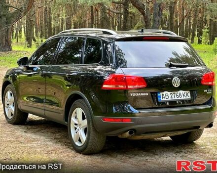 Черный Фольксваген Туарег, объемом двигателя 3 л и пробегом 215 тыс. км за 17900 $, фото 1 на Automoto.ua