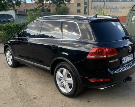 Черный Фольксваген Туарег, объемом двигателя 2.97 л и пробегом 320 тыс. км за 16900 $, фото 1 на Automoto.ua