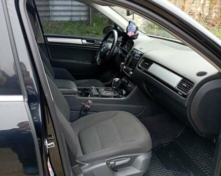 Черный Фольксваген Туарег, объемом двигателя 3 л и пробегом 338 тыс. км за 16200 $, фото 1 на Automoto.ua