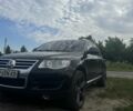 Черный Фольксваген Туарег, объемом двигателя 3 л и пробегом 255 тыс. км за 14500 $, фото 2 на Automoto.ua
