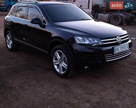 Чорний Фольксваген Туарег, об'ємом двигуна 3 л та пробігом 267 тис. км за 24000 $, фото 2 на Automoto.ua