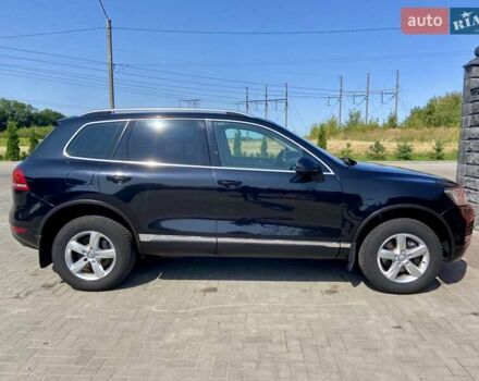 Фольксваген Туарег 2010 в Ровно на Automoto.ua Черный Фольксваген Туарег, объемом двигателя 2.97 л и пробегом 390 тыс. км за 15500 $, фото 10 на Automoto.ua