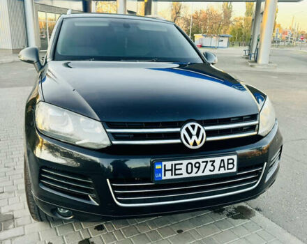 Черный Фольксваген Туарег, объемом двигателя 2.97 л и пробегом 400 тыс. км за 16000 $, фото 1 на Automoto.ua