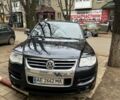 Чорний Фольксваген Туарег, об'ємом двигуна 3 л та пробігом 304 тис. км за 14200 $, фото 1 на Automoto.ua