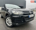 Чорний Фольксваген Туарег, об'ємом двигуна 3 л та пробігом 130 тис. км за 16900 $, фото 1 на Automoto.ua