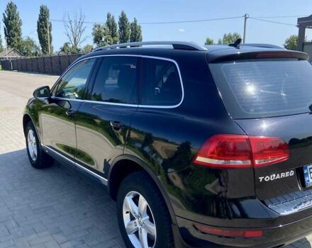 Фольксваген Туарег 2010 в Ровно на Automoto.ua Черный Фольксваген Туарег, объемом двигателя 2.97 л и пробегом 390 тыс. км за 15500 $, фото 1 на Automoto.ua