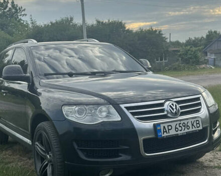 Черный Фольксваген Туарег, объемом двигателя 3 л и пробегом 255 тыс. км за 14500 $, фото 1 на Automoto.ua
