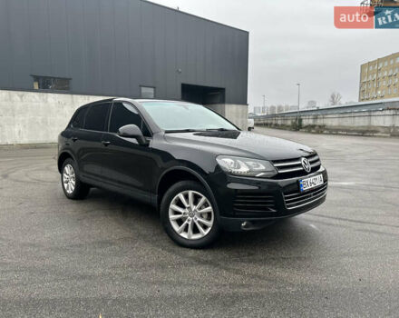 Чорний Фольксваген Туарег, об'ємом двигуна 3 л та пробігом 130 тис. км за 16900 $, фото 2 на Automoto.ua