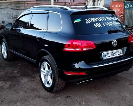 Чорний Фольксваген Туарег, об'ємом двигуна 3 л та пробігом 267 тис. км за 24000 $, фото 1 на Automoto.ua