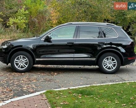 Чорний Фольксваген Туарег, об'ємом двигуна 3 л та пробігом 210 тис. км за 16500 $, фото 6 на Automoto.ua