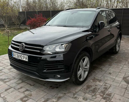 Черный Фольксваген Туарег, объемом двигателя 2.97 л и пробегом 236 тыс. км за 16700 $, фото 1 на Automoto.ua