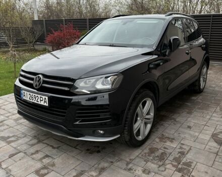 Черный Фольксваген Туарег, объемом двигателя 3 л и пробегом 235 тыс. км за 16700 $, фото 1 на Automoto.ua