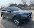 Черный Фольксваген Туарег, объемом двигателя 3 л и пробегом 340 тыс. км за 17500 $, фото 1 на Automoto.ua