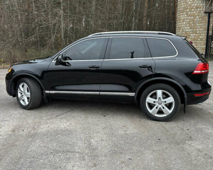 Черный Фольксваген Туарег, объемом двигателя 3 л и пробегом 216 тыс. км за 19500 $, фото 2 на Automoto.ua