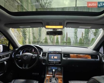 Черный Фольксваген Туарег, объемом двигателя 3 л и пробегом 180 тыс. км за 15499 $, фото 1 на Automoto.ua