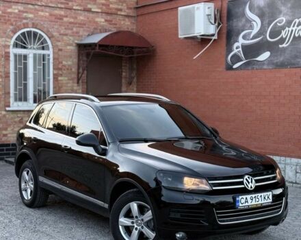 Чорний Фольксваген Туарег, об'ємом двигуна 3 л та пробігом 310 тис. км за 15500 $, фото 1 на Automoto.ua