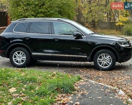 Чорний Фольксваген Туарег, об'ємом двигуна 3 л та пробігом 210 тис. км за 16500 $, фото 1 на Automoto.ua