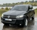 Черный Фольксваген Туарег, объемом двигателя 3 л и пробегом 265 тыс. км за 16900 $, фото 1 на Automoto.ua