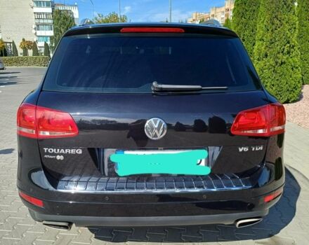 Черный Фольксваген Туарег, объемом двигателя 3 л и пробегом 240 тыс. км за 17500 $, фото 2 на Automoto.ua