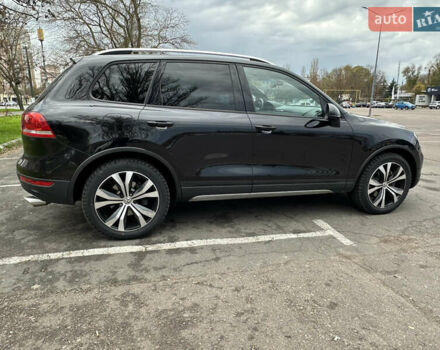 Черный Фольксваген Туарег, объемом двигателя 3 л и пробегом 310 тыс. км за 20800 $, фото 1 на Automoto.ua