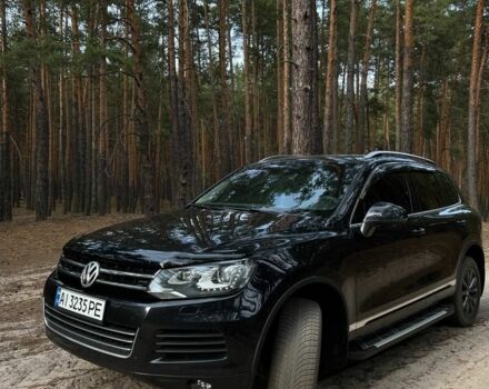 Чорний Фольксваген Туарег, об'ємом двигуна 3 л та пробігом 239 тис. км за 21200 $, фото 2 на Automoto.ua