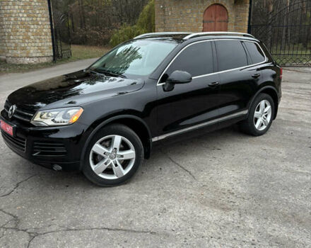 Черный Фольксваген Туарег, объемом двигателя 3 л и пробегом 216 тыс. км за 19500 $, фото 1 на Automoto.ua
