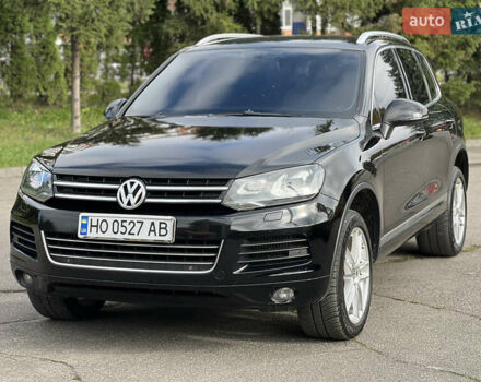 Чорний Фольксваген Туарег, об'ємом двигуна 3 л та пробігом 339 тис. км за 17200 $, фото 1 на Automoto.ua